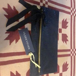 Clare Vivier fold over clutch